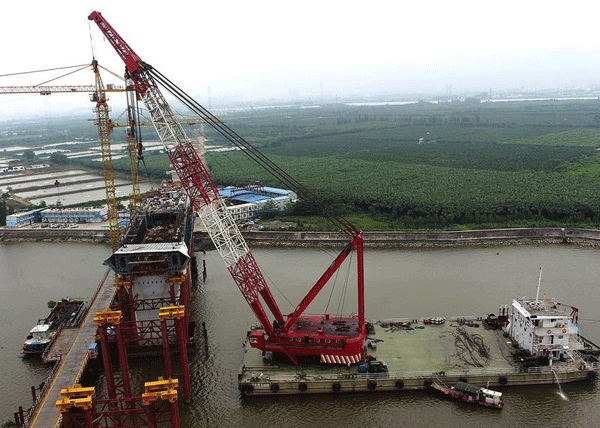 中鐵港航局深茂鐵路潭江特大橋迎來了首片鋼梁（鋼混結(jié)合段）架設 